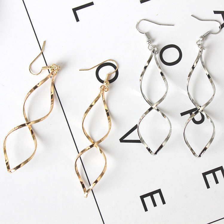 Wavy spiral cross curved earrings