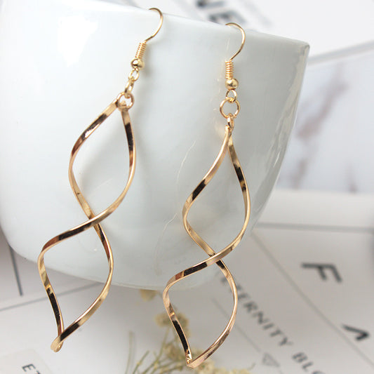 Wavy spiral cross curved earrings